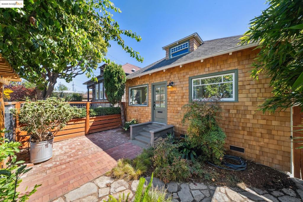 Location, location, location! Just blocks from the cafes, boutiques, and restaurants of vibrant Southwest Berkeley - and 2 blocks to San Pablo park - this 1906 Craftsman offers the perfect blend of timeless charm and modern living. Thoughtfully reimagined with a flowing floor plan, the home features 3 bedrooms, 2 bathrooms, an open living/dining/kitchen, a sun porch, laundry, deck and a detached backyard studio—ideal as a home office or creative space. Highlights include custom tile, skylights, oak floors, wainscoting, crown molding, updated baths, a spacious kitchen with marble counters, new lighting, fresh interior paint, abundant natural light, and a large partially finished attic. Mature, lush landscaping frames both the front and backyards, creating serene outdoor spaces.All this in a prime Berkeley location: just blocks from Berkeley Bowl West, 2 blocks to San Pablo Park, minutes to Downtown, BART, and Cal, and only 2 minutes to Emeryville shopping, shoreline parks and freeway access.