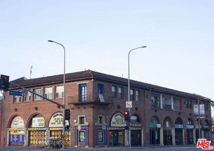 This historic mixed use gem in Korea-town/East Hollywood offers a compelling blend of architectural charm and investment upside. NOTE - Seller may carry, currently no leases, 2 vacant units, future redevelopment upside. The Vermont Corridor Corner lot with two story commercial block retains many period details. Hallways lined with solid wood doors and stenciled glass panes evoke a vintage noir ambiance. while the exterior features brick, stone and decorative plaster accented with terracotta motifs. Original concrete construction, soaring ceilings and graceful arched windows lend the interior both character and grandeur. The 13,964 ft building sits on a high traffic corner at Beverly Boulevard and Vermont Avenue, where metro rail and bus lines converge, drawing significant pedestrian and vehicle flow. The ground floor is designed for retail, and the upper level houses flexible offices or apartments, embodying the mixed-use formula that served Los Angeles neighborhoods long before the term existed. Two units are currently vacant and there are no leases in place. NOTE - the seller is open to carrying financing, giving a new owner immediate flexibility and future redevelopment upside. Located in one of Korea-town / East Hollywood's busiest intersections, the property benefits from a Walk Score of 92 and strong transit and bike ratings. The surrounding neighborhood is known for its mix of luxury high-rise condos and historic structures, vibrant dining and nightlife, and central proximity to Downtown LA, Hollywood and West LA. Zoning (LAC2) allows a broad spectrum of commercial uses and even residential uses permitted in the R4 zone, including shops, studios, theaters, museums and other service establishments with its architectural character, flexible zoning, prime visibility and walkability, this property presents a rare opportunity for investors seeking stable income today and redevelopment potential tomorrow.  The strategic location intersection of Beverly Boulevard and Vermont Avenue benefits from a Los Angeles Metro Station B line and four subway stops generating strong land rents. The building is one of the few such blocks remaining along mixed-use before it was fashionable. 3800 Beverly today sits on a busy corner with strong pedestrian and automobile traffic and is accessible to several bus routes and Metro lines. Nearby new construction of luxury retail and apartment sky-rises only steps away. Close to Lemon Grove, Historic Preservation Overlay Zone Melrose Hill, Franklin Hills, Hillhurst shopping and world-class dining, 2 mins to Los Feliz.  East Hollywood is a vibrant, multicultural community known for its rich blend of global influences and creative energy. The neighborhood offers an eclectic mix of traditional eateries throughout Little Armenia and Thai Town, alongside modern farm-to-table restaurants, relaxed cafes, and lively LGBT-friendly nightlife.  At the heart of the community sits Barnsdall Art Park, home to Frank Lloyd Wright's iconic Mayan-inspired Hollyhock House and the Los Angeles Municipal Art Gallery, where local artists regularly showcase their work. North Virgil Avenue features a collection of vintage shops and unique boutiques, while independent performing arts groups throughout the district contribute to the area's dynamic cultural landscape. Nearby by developments include Sage LA. Hundreds of new apartments are under construction in the neighborhood.