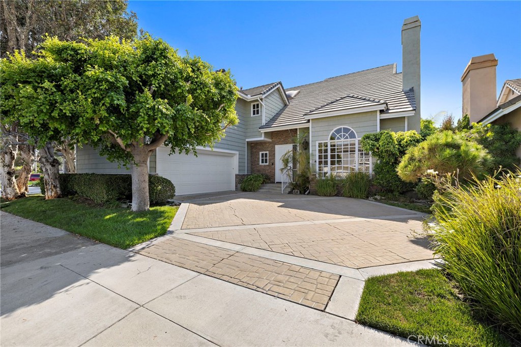 Rare Lease Option Opportunity! Welcome to 4192 Shorebreak Drive, a beautifully maintained and spacious 5-bedroom, 4.5-bath residence in the highly desirable gated community of Faire Marin in Huntington Harbour. This home is available with a lease option to buy, allowing a portion of rent to be applied toward the future purchase price or down payment.Offering 4,272 sq. ft. of living space, this coastal home features a sought-after main floor bedroom with full bath, plus a guest powder room. Freshly painted and move-in ready, it boasts new flooring, new light fixtures, and an entertainer’s kitchen with a large center island, stainless steel appliances, and new countertops currently being installed. The spacious floor plan includes a formal living room with fireplace, an elegant dining room, a wet bar perfect for entertaining, a bright family room, and a versatile loft. Oversized bedrooms and a dedicated office/library provide ample space for work or relaxation.Enjoy the Southern California lifestyle just steps from Huntington Harbour Mall, Trader Joe’s, restaurants, top-rated schools, and parks. Walk to Humboldt Park (Mothers Beach) for paddleboarding, kayaking, or safe swimming in the shallow, roped-off area. Stroll or bike to Sunset Beach for live music, beachside dining, and the vibrant boardwalk. Community amenities include tennis courts, scenic harbor walks, and easy access to nearby beaches.This is a rare chance to lease in one of Huntington Beach’s premier neighborhoods—with the option to make it your forever home.