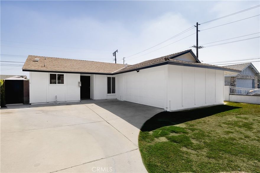Don't miss this incredible opportunity! Charming renovated single story home. Remodeled kitchen, beautiful quartz countertop and tile backsplash. Both bathrooms have been newly renovated. Dining area flows into living room, plenty of space to have dinners and family gatherings. Spacious backyard, covered patio and a grass area perfect for get-togethers. New laminate flooring throughout entire house. New paint inside and out. Double pane windows.  Newer AC unit. Washer and dryer hook-up located inside 2 car garage. Conveniently located near elementary schools, grocery stores and other shopping. Near 605 and 10 freeways.