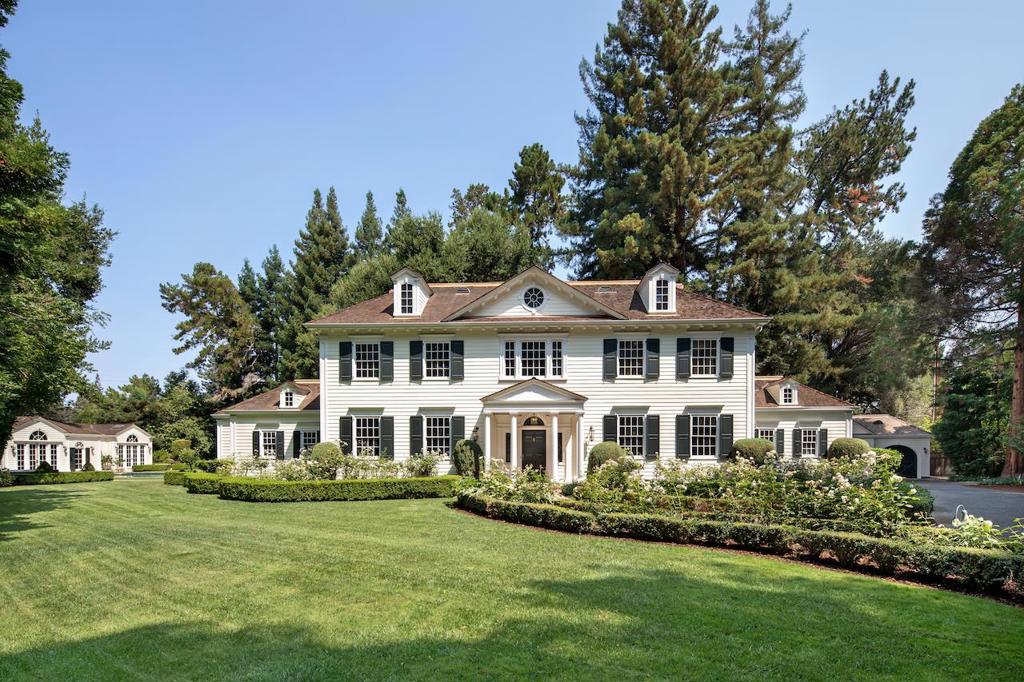 Classic Georgian architecture w/perfectly symmetrical proportions, window shutters, & dormer windows this masterfully built home presents traditional details combined w/luxurious appointments. Built for the current owners with architecture by Pacific Peninsula Group and design by Rory Cleworth. The millwork & moldings are exceptionally detailed & a focal point of the public rooms, along with hardwood floors with lavish inlays. Library/office space is ideal for todays needs, the all-white kitchen is beautifully updated & a wonderful flow from one room to the next invites entertaining on a grand scale. There are 4 bedrooms in the main residence & 2 bedrooms in the large, well-appointed guest house w/full kitchen. The lower level offers wonderful space for fitness & media needs & there is a 4-car garage The gated grounds of more than one acre are equally impressive & perfectly suited to the architecture w/vast stretches of lawn, perimeter redwoods, plus a pool & separate spa.