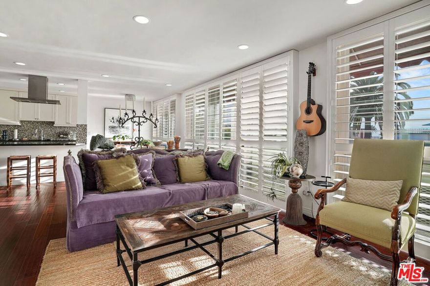 Turn Key, Top Floor 2bd 2ba Condo! Move-in ready with beautifully renovated kitchen and baths. Mahogany hardwood floors, laundry in-unit, dishwasher, stainless steel appliances, gas fireplace, AC, custom shutters, 2-car parking and fantastic roof deck access! Lots of Smart Home features including NEST heating & cooling, recessed Philips HUE lights and Baldwin Evolve entry system. Secure building with elevator, 2-car side by side covered parking spots and garage storage. Excellent natural light and lovely views. Great outdoor space with a Juliet balcony running the entire length of the unit facing the Pacific plus easy access to the rooftop deck! Located near downtown in the coveted and pristine Wilmont neighborhood. Near endless shopping and dining near 3rd Street Promendade, Wilshire, Montana, Palisades Park and the Pier.