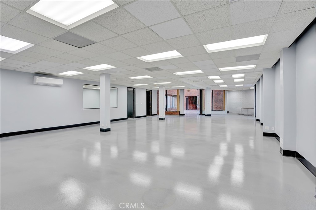 This parcel includes 6,966 square feet of office space comprising 12 private offices, a full kitchen with range and refrigerator/freezer, washer, dryer,, an executive office with private bathroom and shower, three secretarial cubicles, his and hers restrooms, patios, and dedicated break and storage rooms. Like the primary building, each office is outfitted with its own heating and air conditioning unit, providing personalized climate control throughout. Whether for owner-use or as a leased investment, this property is a turnkey solution that offers a level of quality, flexibility, and amenity package that is unmatched in the current market. This is a once-in-a-lifetime chance to secure a landmark office property designed to support business growth, client engagement, and employee satisfaction for years to come. Available at $4,960,000, in line with a recent March 2025 appraisal confirming the same value.
Alternatively, the two parcels may be purchased individually at $2,500,000 and $2,460,000, respectively, subject to land lease.
There is an opportunity to acquire the adjacent parcel for an additional $2.7 million, bringing the total purchase price to $5.3 million for both parcels comprising this exceptional Newport Beach office property. This combined acquisition offers a rare chance to own the entire building, maximizing functionality, value, and long-term potential in one of Southern California’s most prestigious business locations.