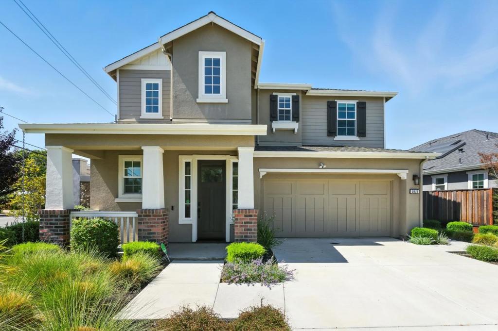 Live in style in this 2022 model home by award-winning Classics Communities. 5879 Caleb Court sits on the largest lot in an exclusive 9-home cul-de-sac with fully landscaped yards and an oversized driveway. Enjoy a dramatic two-story foyer, luxury vinyl floors, and an open layout perfect for entertaining. The chefs kitchen boasts a generous island with bar seating, geometric backsplash, and GE Café stainless appliances, flowing seamlessly to the living and dining areas that open to the backyard. A main-level en-suite bedroom with walk-in shower is ideal for guests. Upstairs, the stunning primary retreat offers a spa-like bath with walk-in closet, dual vanity, gray quartz countertops, and a resort-style marble tile shower. Modern upgrades include a 50-amp EV outlet, solar prewire, reverse osmosis system, water softener, and designer laundry with GE washer/dryer. Prime location near Peninsula and Silicon Valley, minutes to Dumbarton Bridge and I-880.
