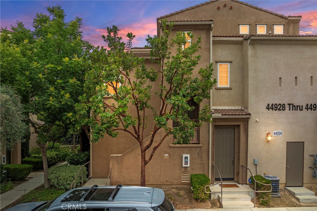 Unique Multi-Suite Floor Plan in Gated Temecula Lane – Prime South Temecula Location!! Discover a rare and versatile layout in this 3-bedroom, 3.5-bathroom condo located in the sought-after Temecula Lane gated community. Each spacious bedroom features its own private full bathroom, offering exceptional flexibility for multi-generational living, roommates, or guest accommodations. Two bedrooms, including the primary suite, are located on the main level and open through sliding glass doors to private patios. The mid-level is the heart of the home, boasting an open-concept great room, casual dining area, and an upgraded kitchen with granite countertops, stainless steel appliances, walk-in pantry, and a large breakfast bar. Sliding doors lead from the dining space to a roomy patio, ideal for BBQs and outdoor dining. Upstairs, the third bedroom enjoys its own en-suite bath, providing maximum privacy. As a resident of Temecula Lane, you’ll enjoy resort-style amenities including a pool, spa, clubhouse, BBQ area, tennis court, and playground. The community is nestled in top-rated school districts and minutes from Pechanga Resort & Casino, world-class wineries, Old Town Temecula, and a variety of shops and dining options. With easy freeway access, commuting or weekend getaways are effortless. This home offers an unbeatable combination of style, function, and location—schedule your showing today!