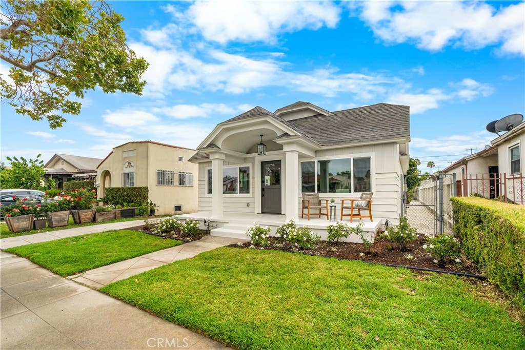 Photo of 1844 W 39th Street, Los Angeles, CA 90062 (MLS # SB26114376)