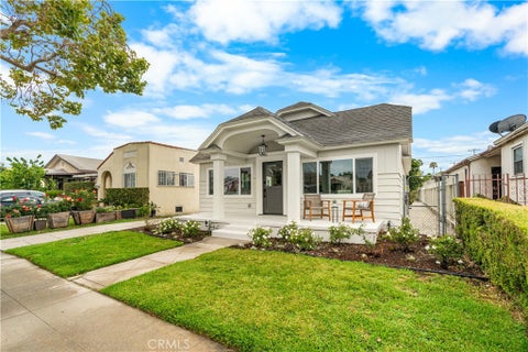 Photo of 1844 W 39th Street, Los Angeles, CA 90062 (MLS # SB26114376)
