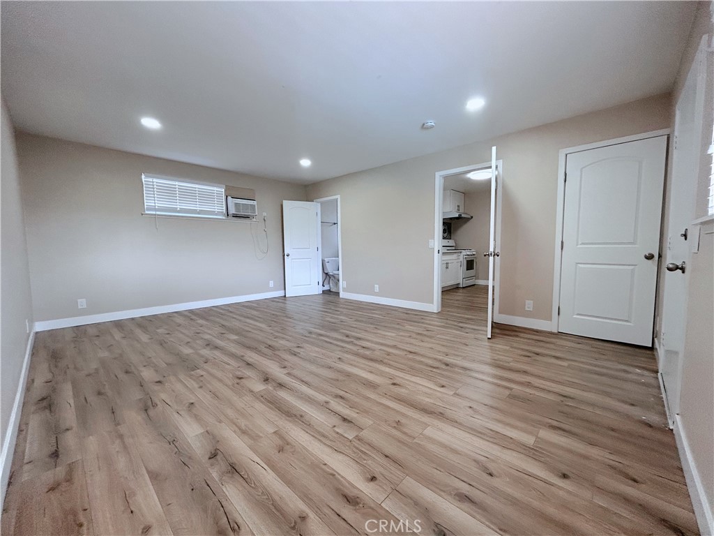 Brand new studio with private entrance, featuring a full bathroom, spacious kitchen, and stylish flooring throughout. Rent includes all utilities. Shared washer and dryer are available for convenience — enjoy modern, hassle-free living!