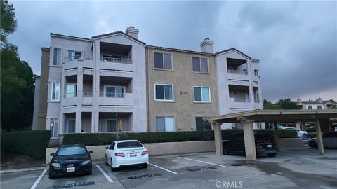 Photo of 2380 Del Mar Way #202, Corona, CA 92882 (MLS # IG26079754)