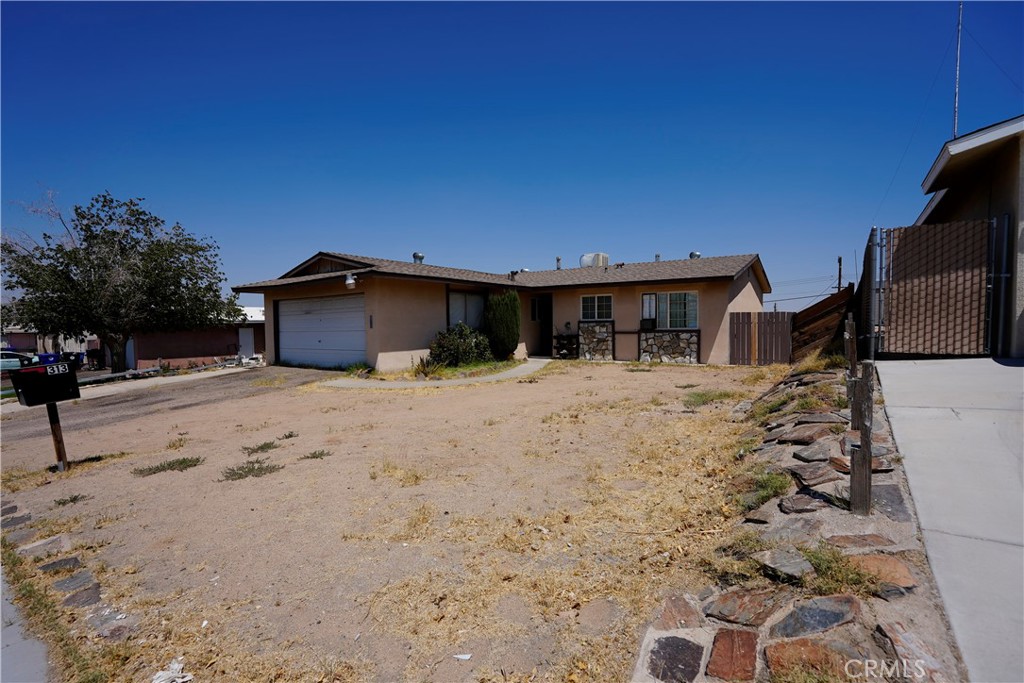 Charming single-story 3-bedroom, 2-bath home in the heart of Barstow with incredible potential! Offered AS-IS and Priced TO SELL! This spacious property features an open floor plan with abundant natural light, a functional kitchen, and ample storage. The generous lot provides endless possibilities for outdoor living, gardening, or expansion. Conveniently located near shopping, dining, schools, parks, and commuter routes, it’s ideal for first-time buyers or investors seeking their next project. While it does need some repairs and updates, with a little TLC this home could truly shine and be worth significantly more. Don’t miss this chance to own a well-located property with great bones and strong upside potential!