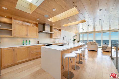 Photo of 11950 Beach Club Way, Malibu, CA 90265 (MLS # 26640257)