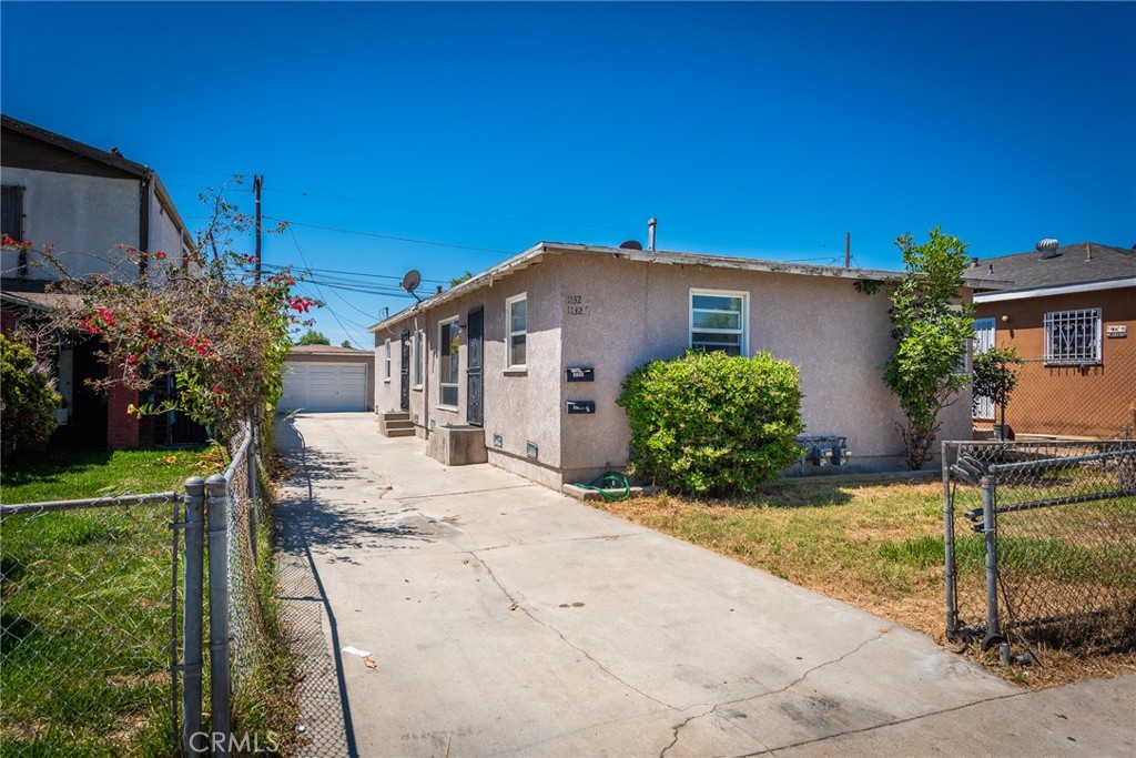 Welcome to an exceptional investment opportunity! This charming duplex, situated on a spacious 4,845 sq. ft. lot, offers robust income potential for both owner/users and savvy investors. Each of the two units features a desirable 2-bedroom, 1-bathroom layout, complete with ample parking. Imagine the possibilities: from maximizing rental income to exploring future redevelopment and adding ADUs. While some cosmetic repairs are needed, modern updates will undoubtedly elevate its appeal. This rare find boasts a fantastic central location, just a short walk to transportation and shopping centers, ensuring consistent demand. Don't miss out on acquiring two units on a generous lot in a truly prime area!