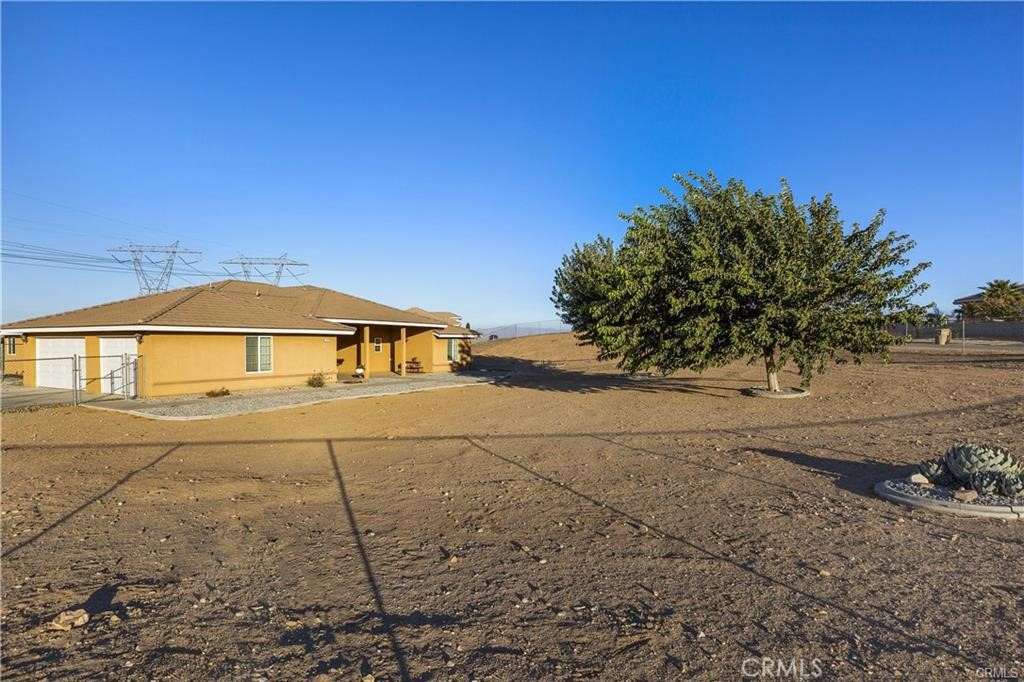 Large Unobstructed VIEWS, Fully Remodeled Kitchen & Floors, PAVED Access, OPEN Floor-Plan, and Large Bedrooms!
Beautiful single-story home located in the highly desirable area of East Oak Hills. Just off Ranchero Road with fully paved access, this home sits on 2.5 acres of fenced land. Features include an oversized finished 3-car garage with ample storage, a thoughtfully planned open-concept layout, and a fully remodeled kitchen with a large island perfect for entertaining. Fully remodeled flooring throughout adds a fresh, modern touch. Enjoy a spacious living area with views of your fireplace, living room, and large enclosed backyard patio. Generously sized bedrooms, NATURAL GAS, GREAT SCHOOLS, VINYL FENCED BACKYARD, and a large backyard with room for a pool, RV, and many other toys—plus stunning unobstructed mountain views—make this home truly exceptional.