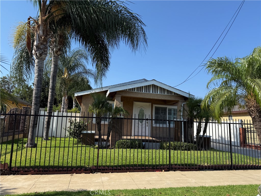 Welcome to this stunning home nestled in a coveted section of Pomona, offering an exceptional living experience. This beautiful residence features 960 square feet of living space, including three generously sized bedrooms and 1 bathroom. Situated on a large lot, the property includes beautiful front and back yards. Back yard has ample space for relaxing and enjoying sunny California days. Garage is detached and has 1 parking space, there are also space for parking on the drive way. Washer and dryer hookups are in the garage. This is a must see property.