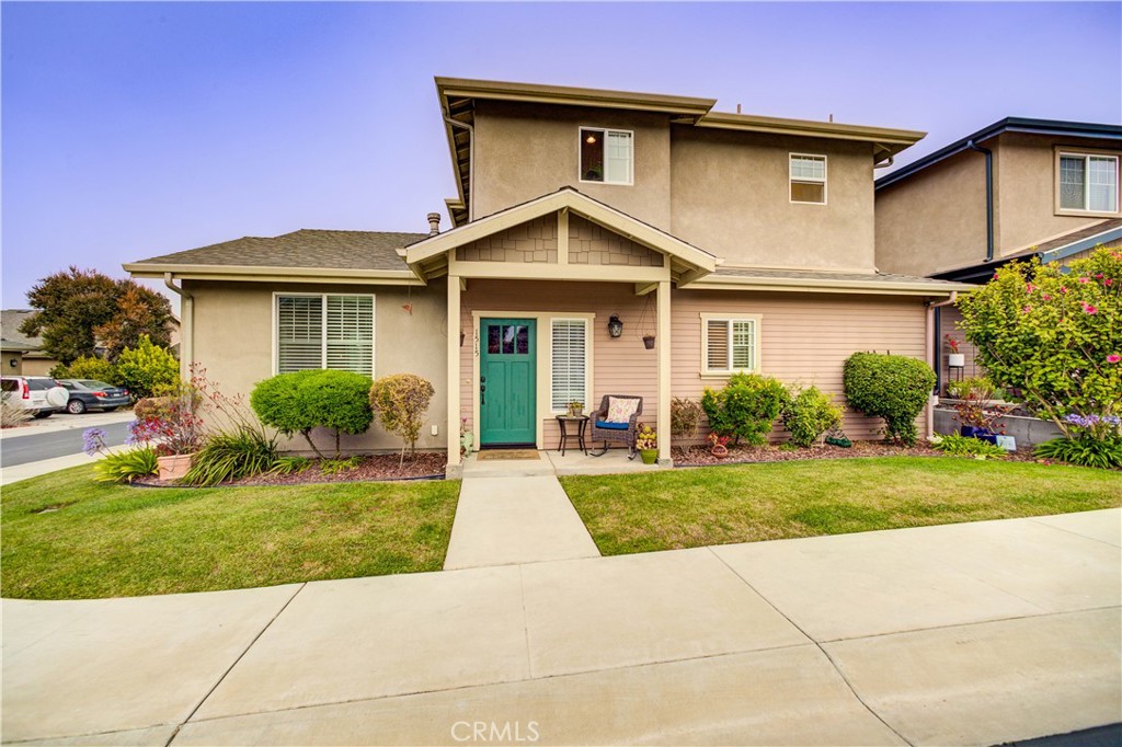 Just two miles from the sand and surf, 1515 Nabal Court is a delightful two-story home tucked away in the charming Old Avocado Ranch neighborhood of Oceano. Set on a spacious corner lot, this 3-bedroom, 2.5-bath residence offers 1,498 square feet of thoughtfully designed living space that blends coastal charm with modern comfort. Step inside to an inviting open-concept layout that seamlessly connects the living, dining, and kitchen areas. The living room is anchored by a cozy fireplace and stylish light fixtures, while the kitchen features stainless steel appliances, granite countertops, ample storage, and a breakfast bar perfect for casual mornings. The primary suite is conveniently located on the main floor, providing comfort and privacy with sliding glass doors that lead to a peaceful, fully fenced backyard. A hallway laundry closet adds everyday functionality. The backyard is beautifully landscaped and ideal for entertaining, with a mix of astroturf, concrete, and brick patio areas illuminated by warm café lighting. Upstairs, you'll find two additional bedrooms and a spacious bathroom with a double sink vanity—perfect for family, guests, or a home office setup. An attached garage provides additional storage and convenience. Located in the well-maintained Old Avocado Ranch community—known for its peaceful streets and close-knit feel—this turnkey home offers the best of Central Coast living. Whether you're seeking a full-time residence or a relaxing coastal retreat, 1515 Nabal Court delivers style, comfort, and location in one of Oceano’s most desirable neighborhoods. Don’t miss this rare opportunity to live just minutes from the beach in a home that’s ready for you to move in and enjoy.