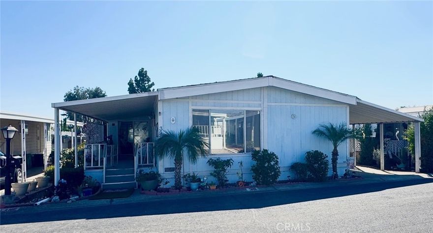 REDUCED FOR QUICK SALE! Below market value!! Step into this Beautiful Home with Views of the Foothills! This spacious 2bedroom 2bath+ Family Room features over 1,400sqft and is located in a 55yrs+ Community in the desirable City of La Verne! This home features an open floor plan that has been updated including interior paint and flooring. Featuring central air conditioning and heating with ceiling fans tastefully placed throughout the home. Kitchen features lots of cabinets and counterspace complete with a breakfast bar with light updates including paint, tile flooring, stove top and rangehood. Both bedrooms are spacious and can easily accommodate your full-sized furnishings. Master bedroom is very spacious and has a mirrored wardrobe that spans the length of the wall, complete with its own private bathroom with dual sinks, vanity, walk-in shower, and separate tub. 2nd bedroom features a walk-in closet. This amazing home features a screened in enclosed porch just outside of the slider in the family room that opens up to an outdoor patio area. Exterior features low maintenance landscaping and long carport can easily accommodate 3 car parking. Community features a pool, jacuzzi, and clubhouse area for the resident's use and enjoyment. Located in the Foothill Communities of La Verne close to shopping, restaurants, entertainment, Senior Centers, and so much more! Don't miss out on this incredible buy!