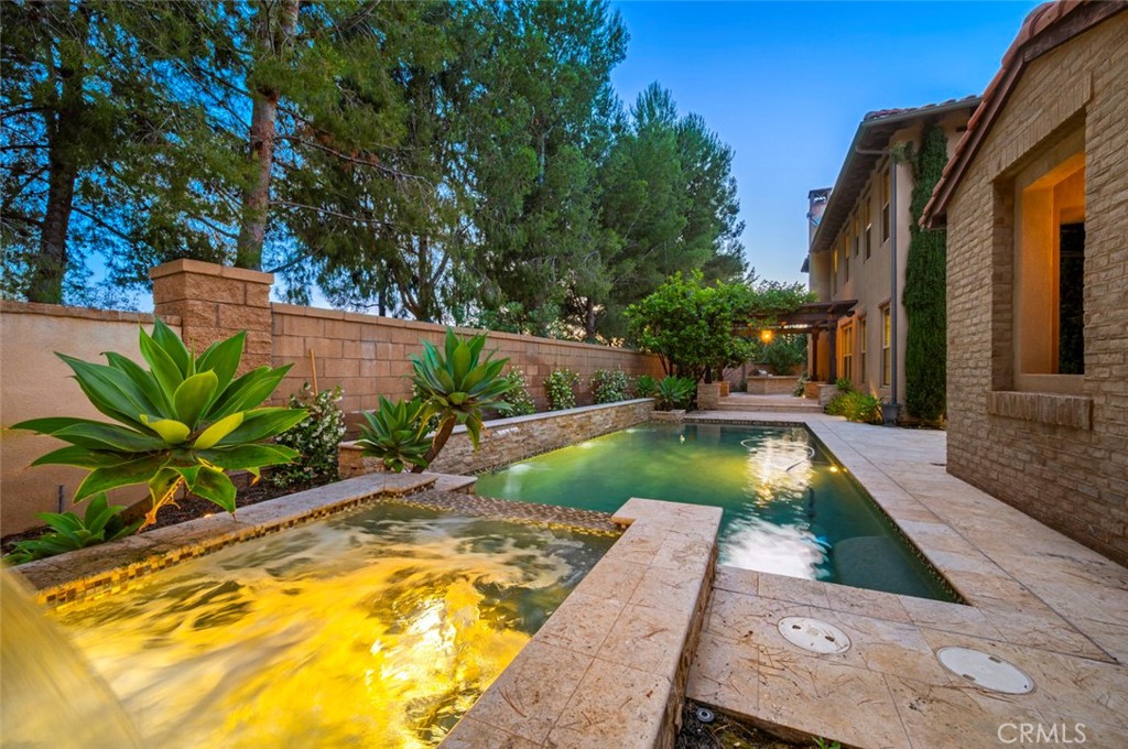 VERY RARE OPPORTUNITY TO OWN THE POOL HOME IN IRVINE *** HIGHLY UPGRADED BEAUTIFUL HOME IN THE NEWER DEVELOPEMENT OF PORTOLA SPRINGS COMMUNITY *** HOME FEATURE 5 BEDROOM + 5.5 BATHS + 2 CAR ATTACHED GARAGE *** THE LARGEST MODEL OF LAS COLINAS DESIGNED BY TAYLOR MORRISON BUILDER AND EXTRA STORAGE SPACE ADDED BY THE BUILDER FROM 3RD CAR GARAGE (THAT'S WHY THE HOME SIZE SHOWS DIFFERENT WITH ACCESSOR'S DATA) *** FRONT GATE LEADS PRIVATE SWIMMING POOL & SPA WITH PRIVATE SIDE & BACKYARD *** SEPERATE CASITA WITH FULL BATH IS PERFECT FOR MULTI-PURPOSE *** FORMAL ENTRY WITH UPGRADED STONE FLOOR *** FORMAL LIVING AND DINING AREA WITH CEILING BEAM, FRENCH DOOR TO THE POOL AREA *** BEAUTIFUL KITCHEN WITH CENTER ISLAND, GRANITE COUNTERTOP, MARBLE MOSAIC FULL BACKSPLASH, BUILT-IN REFRIGERATOR, HIGH-END APPLIANCES, AND MORNING ROOM *** LARGE FAMILY ROOM WITH COZY FIREPLACE *** UPGRADED STAIRCASE BRINGS YOU UPSTAIRS *** MASTER BEDROOM WITH LARGE WALK-IN CLOSET & EXTRA GYM/OR SITTING ROOM *** MASTER BATHROOM WITH HIGHLY UPGRADED STONE DECORATIVE TUB AND WALK-IN SHOWER *** EVERYROOMS ARE DESIGNED WITH OWN BATHROOM *** VERY POPULAR PLAN AND UPGRADED FOR BIG FAMILY BY THE BUILDER *** BEAUTIFULLY LANDSCAPED FIREPIT, BUILT-IN BBQ WITH LIMESTONE FLOOR IN BACKYARD *** MUST SEE *** PLEASE CHECK 3D TOUR FOR MORE DETAIL *** IT WON'T LAST LONG ***