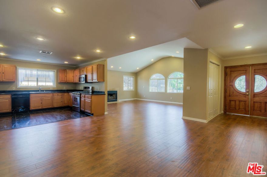 WALNUT ACRES PRIVATE GATED ENTRY HOUSE. SPACIOUS SINGLE STORY, 4 BED, 3 BATH WITH 2 DENS. OPEN LAYOUT WITH VAULTED CEILINGS PERFECT FOR ENTERTAINING. WALK-IN CLOSETS IN 3 OF THE BEDROOMS. GATED CIRCULAR DRIVEWAY WITH SPACE FOR UP TO 5 CARS IN ADDITION TO THE 2 CAR GARAGE. 2 CENTRAL ACs, 2 MASTER BEDROOMS, RECESSED LIGHTING THROUGHOUT, WALK-IN PANTRY, 3 FIREPLACES! PRIME AREA OF WOODLAND HILLS WITH THE AWARD WINNING EL CAMINO REAL CHARTER HIGH SCHOOL. LOTS OF RESTAURANTS AND SHOPS NEARBY. MINUTES AWAY FROM THE NEWLY EXPANDED WESTFIELD TOPANGA MALL, TOPANGA SOCIAL, TOPANGA VILLAGE, AND THE WARNER CENTER BUSINESS DISTRICT. SHORT TERM LEASE AND FILMING CONSIDERED AT A PREMIUM.