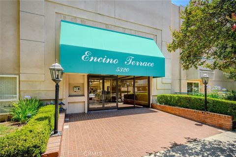 Photo of 5320 Zelzah Ave AVE #314, Encino, CA 91316 (MLS # GD26111796)