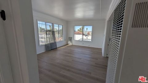 Photo of 6820 S Van Ness Avenue, Los Angeles, CA 90047 (MLS # 26644219)