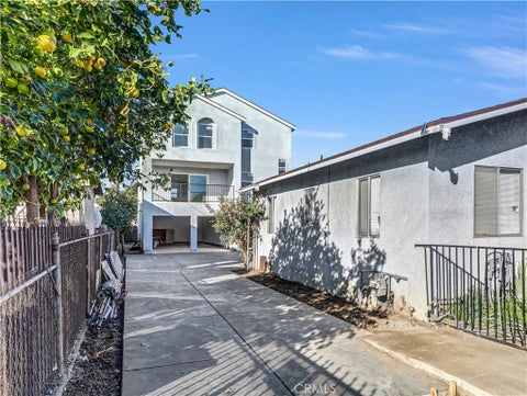 Photo of 1231 S Rowan Avenue, Los Angeles, CA 90023 (MLS # MB26215525)