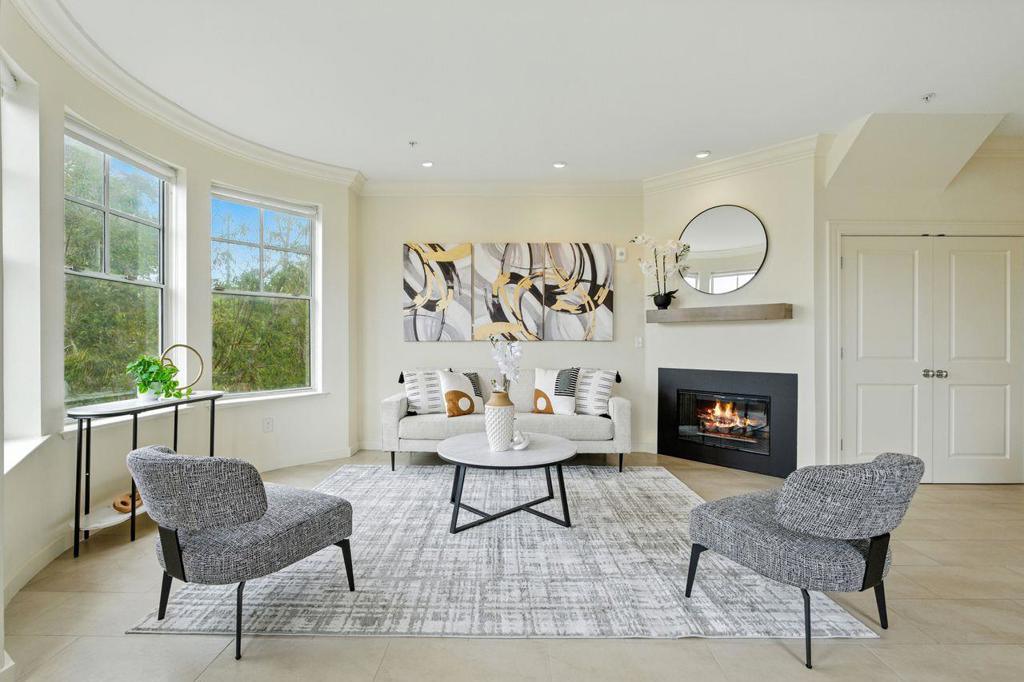 Welcome to this stunning corner-unit townhome in the heart of San Franciscos vibrant North of Panhandle neighborhood. This rare offering includes two parking spaces and a private, deeded roof deck. The main level greets you with a spacious entry and an open, airy layout that flows seamlessly from the living room to the dining area and kitchen. Bathed in natural light from its sunny southwest exposure and enhanced by lofty ceilings, the home offers captivating views of Mount Sutro, creating a bright and uplifting atmosphere. Upstairs, the primary suite features an updated walk-in closet and a spa-inspired bath with a soaking tub and a separate skylit walk-in shower. A generous second bedroom includes its own en-suite bath and double closet for added convenience. With an unbeatable Walk Score, this prime location puts you moments from Golden Gate Park, the Panhandle, and the iconic Painted Ladies. Take a trip to the vibrant Divisadero Corridor or the eclectic shops and cafes of Upper Haight, and enjoy the convenience of Trader Joes, Whole Foods, and Target just a short trip away. Dont miss your chance to experience the best of San Francisco urban living in this rarely available boutique building.