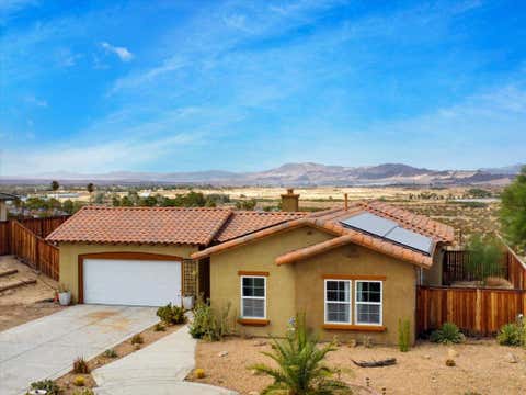 Photo of 74106 Manana Drive, 29 Palms, CA 92277 (MLS # 219151785DA)