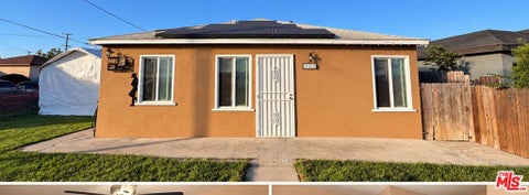 Photo of 949 W Brazil Street, Compton, CA 90220 (MLS # 26103059)