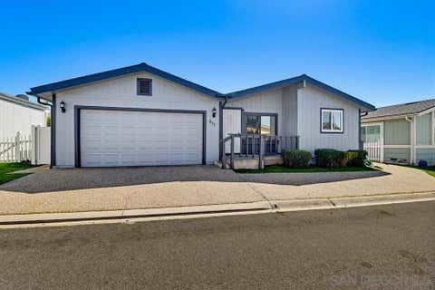 Photo of 611 Via Santa Paulo, Vista, CA 92081 (MLS # 260005910SD)