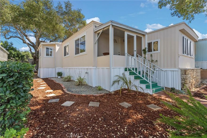 Step into luxury with this beautifully and highly upgraded 2-bedroom PLUS den, 2-bath home, where modern elegance meets effortless comfort. Every detail has been thoughtfully curated, from the sleek gourmet kitchen featuring premium stainless steel appliances and laminate countertops to the spacious open-concept living area to dining area with stunning designer finishes. Both bedrooms offer generous space and serenity, with the primary suite boasting a spa-like ensuite bath with jacuzzi tub and shower. Gorgeous, updated walk-in shower, pedestal sink and LED mirror in the guest bath. Laundry room in den that could also be used as a third bedroom! Enjoy year-round relaxation in the screen in patio with gorgeous mountain views or relax in the private garden backyard, perfect for unwinding after a long day. Nestled in the peaceful 55+ community of El Sereno with LOW SPACE RENT of just $702/month, fantastic amenities of pool, clubhouse with fireplace and game room, community laundry, this home is a true gem that blends style, convenience, and contemporary living. Don’t miss the chance to have affordable living in Ojai and make it yours!