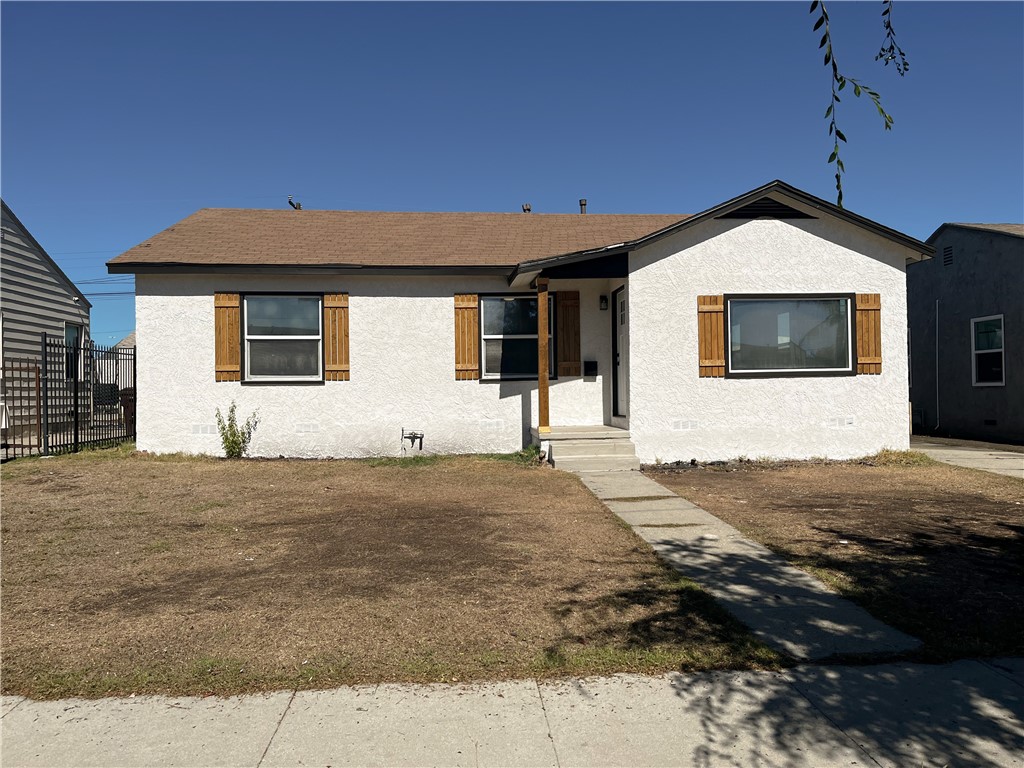 Beautifully remodeled 3 bedroom, 1 bath home on a quiet street of well-kept homes in Compton. The remodel has just been finished and features new paint inside and out, new dual-pane windows, recessed lighting, new flooring throughout. The bright and cheerful, remodeled kitchen has new cabinets, quartz countertops, new stove/oven, dishwasher, and floors. The bathroom also has new fixtures with quartz sink and new bath/shower with tile. Two of the bedrooms have mirrored doors and all three have ceiling fans. There is also a ceiling fan in the dining area. The laundry room also has new cabinets.