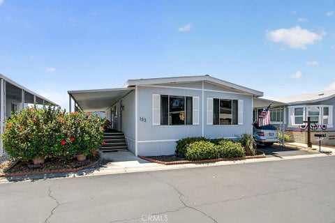 Photo of 24001 Muirlands Boulevard #153, Lake Forest, CA 92630 (MLS # OC26157923)