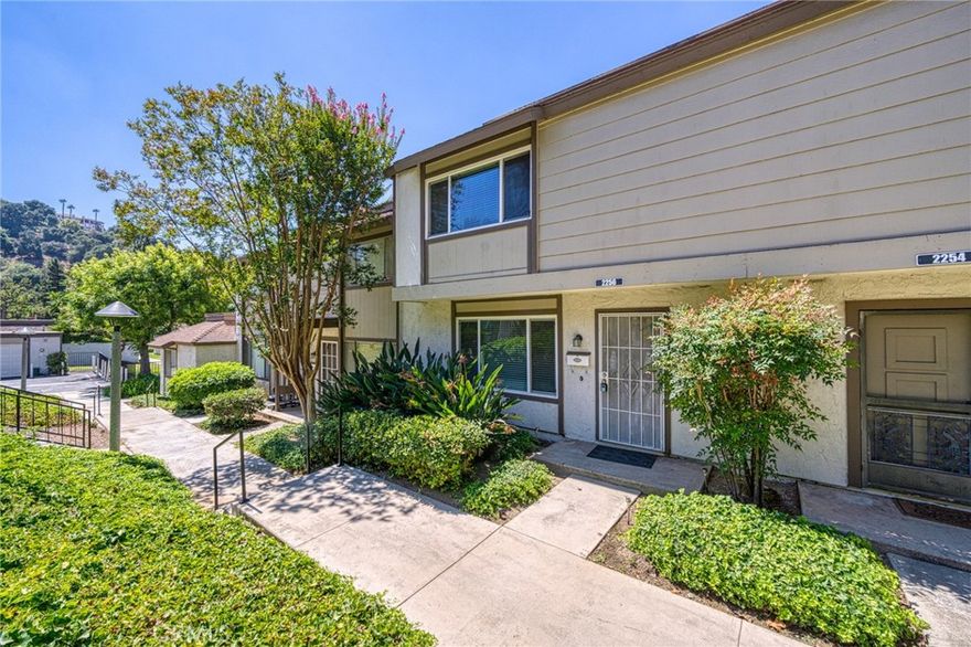 Welcome to this charming and quiet condo featuring 3 bedrooms and 1.5 bathrooms, perfectly located near top-rated schools including Evergreen Elementary, Chaparral Jr. High, and Diamond Bar High School. All bedrooms are conveniently situated upstairs, offering privacy and comfort. The home offers an updated kitchen with upgraded cabinets, stainless steel appliances, and granite countertops. Bathrooms were also refreshed with granite vanities and a modern shower. Dual-pane windows and an upgraded central A/C system ensure efficiency and comfort throughout the year. Step outside to a private patio yard, ideal for relaxing or entertaining, with direct access to a spacious 2-car garage. The community offers additional amenities including a refreshing association swimming pool. Nestled in a peaceful neighborhood with easy access to the 57 and 60 freeways, this home effortlessly combines style, comfort, and convenience.