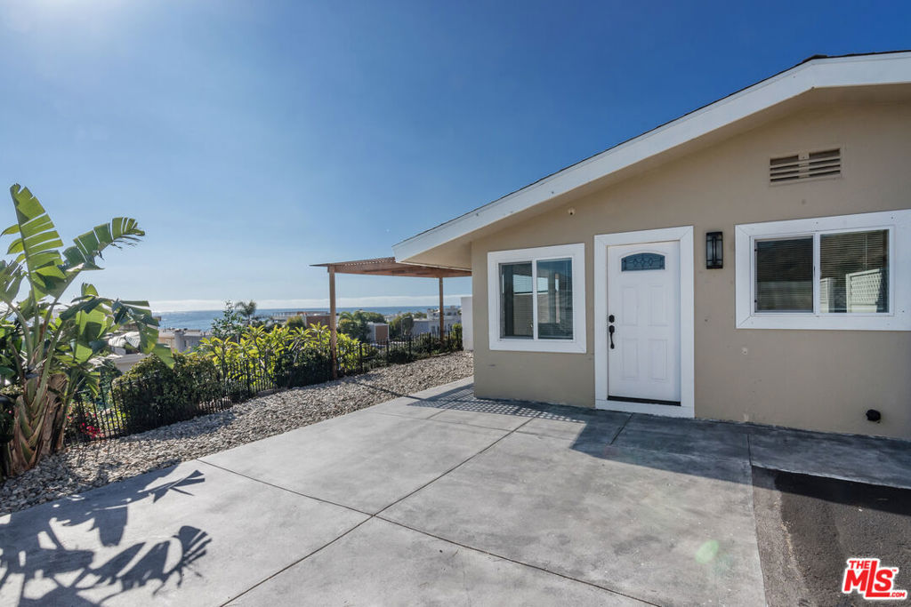Charming Malibu Beach Cottage with Breathtaking Ocean Views. Perched above the iconic Carbon Beach, this stunning Malibu retreat offers panoramic ocean views stretching from the Malibu Pier to the Santa Monica Bay. This light-filled coastal home is the perfect escape, blending classic beach cottage charm with modern updates. Property Features: Unbeatable Location Just across the street from Carbon Beach, with easy beach access and only minutes from Malibu's finest dining and shopping, including Nobu, Malibu Farm, Malibu Country Mart, and The Lumberyard. Expansive Ocean-View Patio. Relax and take in the whitewater views from your private outdoor space, complete with a pergola for shade. Bright & Airy Interiors. Vaulted, beamed ceilings, oversized picture windows, and a cozy gas fireplace create an inviting coastal ambiance. Kitchen featuring stainless steel appliances, ample cabinet space, and an ocean-view breakfast bar. Remodeled Bathroom. A modern retreat with a shower/tub combo for relaxation after a day at the beach. Indoor-Outdoor Living. The seamless indoor-outdoor flow makes this home perfect for soaking in Malibu's famous sunsets. This rare rental opportunity is the ideal beachfront getaway or year-round coastal home.