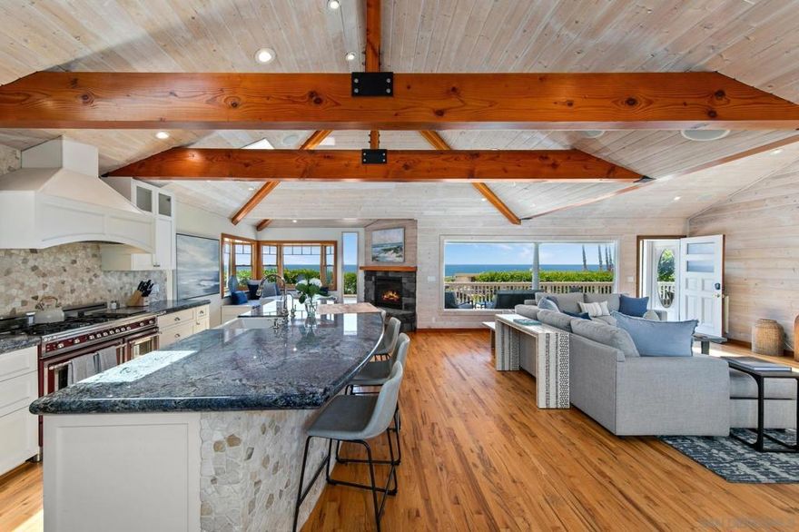 Oceanfront compound in North Pacific Beach featuring a 2 bed, 2.5 bath main home with panoramic ocean views and open-concept living, plus a 1 bed, 1 bath casita with full kitchen and private entrance. The lush backyard offers a spa, built-in BBQ, tranquil waterfall, and a footbridge connecting both homes. With the sand just across the street, this thoughtfully designed property blends comfort, privacy, and elevated coastal living.  Sleeping Accommodations (Maximum Occupancy 6): Bedroom 1 - 1 King bed Bedroom 2 - 1 Queen bed Bedroom 3 - 1 Queen bed There are a total of 4 bathrooms - 3 full baths and 1 half bath. STR-12179L TOT-520224