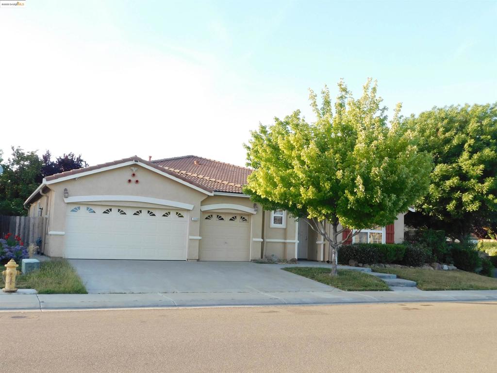 Welcome to 3069 Nicoletta Lane, a meticulously maintained single-story residence nestled in the sought-after La Morada community of Stockton. Spanning approximately 2,500 square feet, the home comprises 3 spacious bedrooms, 2.5 bathrooms, attached 3-car garage and a versatile den with elegant glass double doors, perfect for use as an office or playroom. The open-concept living area seamlessly integrates the living room, dining space, and kitchen, creating an inviting environment for both relaxation and entertainment. The gourmet kitchen equipped with: Granite countertops, a central island with sink, ample cabinetry and pantry space. Whether preparing daily meals or hosting gatherings, this kitchen caters to all your culinary needs? The primary suite featuring: A generously sized walk-in closet, large windows allowing natural light, an en-suite bathroom with dual sinks, a soaking tub, and a separate shower stall.The home's exterior is equally impressive, with a well-manicured front and back yard, ideal for outdoor activities and gatherings. The property is situated on a tranquil street, easy access Highway 99, shopping centers, schools, and recreational facilities. Property has solar and tesla power cell.