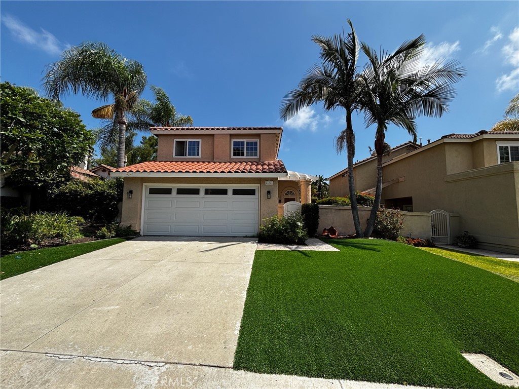 This 3-bedroom, 2.5-bath, 1,658 sq ft home has been thoughtfully renovated throughout. The brand-new kitchen features modern cabinetry, sleek countertops, and all-new stainless steel appliances. Fresh interior paint, new windows, and new flooring create a bright, move-in-ready space. The open floor plan includes a spacious living area with a cozy fireplace and direct access to the private backyard—perfect for entertaining. Ideally located near parks, schools, shopping, and just minutes from Southern California’s best beaches.