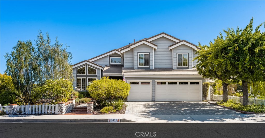 THIS STUNNING HOME IN THE HILLS OF NORTH ORANGE HAS SPECTACULAR PANORAMIC AND CITY LIGHT VIEWS! ADDITIONALLY, it’s located on a PRIME CORNER LOT that is both QUIET AND PRIVATE, WITH ONLY 1 NEIGHBOR! The OPEN FLOOR PLAN is TASTEFULLY DECORATED and UPGRADED THROUGHOUT. BEAUTIFUL HARDWOOD FLOORING is throughout most of the living area and CATHEDRAL CEILINGS highlight the living room, dining room and master suite. The FUNCTIONAL FLOOR PLAN includes a living room with picture window, FORMAL DINING ROOM for those special occasions, a SPACIOUS SEPARATE FAMILY ROOM featuring a DRAMATIC BRICK WOOD BURNING (or gas) FIREPLACE, A GORGEOUS REMODELED KITCHEN has a SPACIOUS ISLAND WITH SEATING and LOADS OF CABINETS, A WONDERFUL MASTER SUITE with ADJOINING RETREAT that would make a nice home office or library and a SPRAWLING ATTACHED DECK WITH STUNNING VIEWS and a HUGE MASTER BATH with separate tub and shower and WALK-IN CLOSET and a CONVENIENT INDOOR LAUNDRY ROOM with sink and storage space. An ATTACHED 3 CAR GARAGE has overhead storage. The SPARKLING POOL AND SPA are perfect for summer entertaining. There’s also a COVERED PATIO and a wonderful BBQ with fridge. This home is sure to impress!