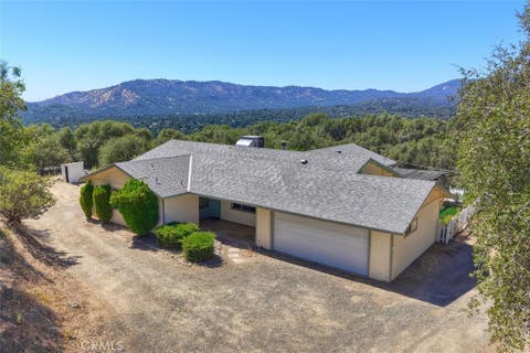 Photo of 46316 Eastwood DR S, Oakhurst, CA 93644 (MLS # MP26157990)