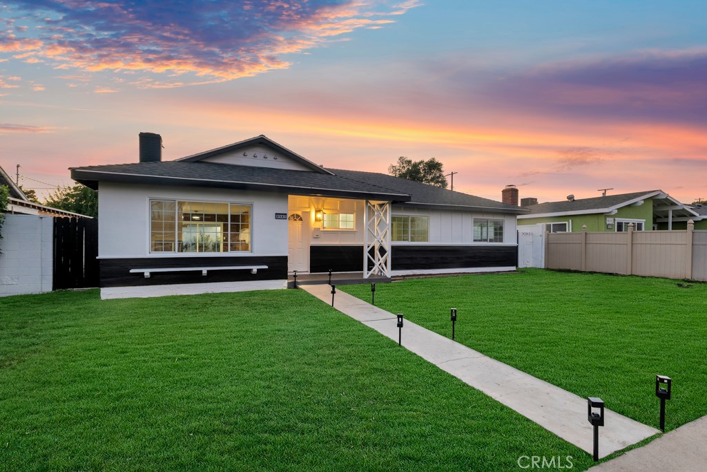 Move-In Ready Gem in Northridge! Welcome to this beautifully updated single story home offering nearly 1,600 square feet of stylish and comfortable living space, featuring 4 bedrooms and 2 bathrooms. From the moment you arrive, you'll be captivated by its undeniable curb appeal and modern upgrades. Thoughtfully enhanced throughout, the home boasts all-new electrical panels with EV charging capability, fresh interior and exterior paint, new gates, updated front yard and backyard irrigation system and upgraded exterior lighting. Inside, a light-filled open floor plan greets you with brand-new vinyl wood flooring, smooth ceilings, modern light fixtures, new interior doors and hardware, and energy-efficient Milgard dual pane windows. The spacious living room, centered around a cozy fireplace, flows effortlessly into the dining area and cook’s kitchen. Here, you'll find a convenient breakfast bar and brand-new GE stainless steel appliances—ideal for both everyday living and entertaining. The private primary suite features a generous wardrobe closet and a remodeled ensuite bathroom with a designer vanity and tiled walk-in shower. Three additional bedrooms are well-proportioned and share access to an updated full bathroom with new vanity, ensuring ample space and comfort for everyone. Plus both bathrooms have new Rainfall/Handheld shower fixtures. Modern amenities include indoor laundry, plus central air and heat with a Google Nest thermostat, ensuring year-round comfort. A large sliding glass door off the dining area fills the space with natural light and leads to a sprawling pool sized backyard - complete with a lush lawn, spacious patio for outdoor dining, and a detached 2-car garage with new epoxy flooring, fresh paint and LED lighting. With possible ADU potential and located just minutes from major freeways, schools, shopping, and dining, this turnkey home blends charm, functionality, and exciting future possibilities.