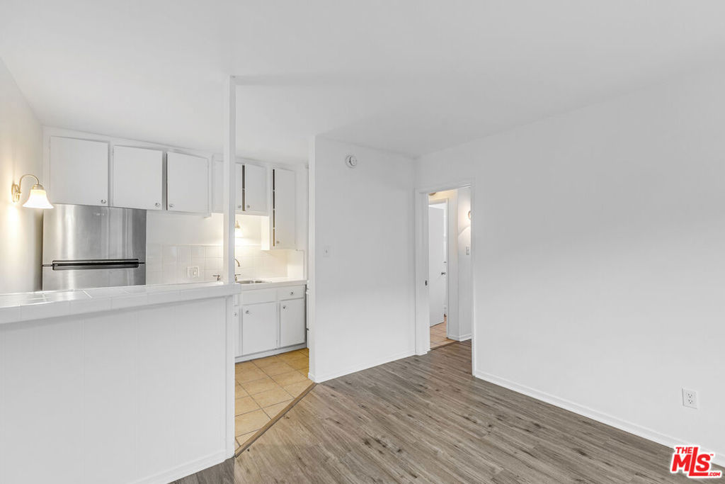 Looking for a sweet spot to call home in one of the Westside's most walkable neighborhoods? This ground-floor unit offers a great combination of comfort, character, and locationperfect for anyone looking to settle into one of LA's most accessible neighborhoods. The unit features a functional open layout with hardwood-style floors throughout. The kitchen includes a breakfast bar, tile countertops, custom cabinetry, sleek stainless steel fridge, and easy-care flooring throughout. The vintage pink tile in the bathroom adds just the right amount of retro charm. This unit is part of a small, quiet building with on-site laundry and a pet-friendly policy so bring your furry companion along. Street parking only, but with bike-friendly streets, access to public transit, and close proximity to the 405 and 10, getting around is a breeze. Enjoy being just blocks from downtown Mar Vista, the Sunday farmers market, and all the local gems that make this neighborhood such a sought-after place to live. This Mar Vista cutie won't last long. Schedule a tour and come see it for yourself.