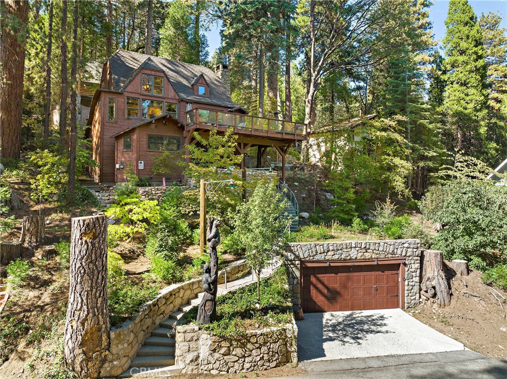 Escape to a stunning Furnished, short Term luxury rental villa nestled in the heart of Lake Arrowhead, just a stone's throw away from the Village, Resort, Beach Club, restaurants, and shops. This fully renovated cabin boasts unparalleled elegance and comfort, featuring custom handcrafted woodwork throughout. 2 NIGHT MINIMUM
This 4-bedroom, 4-bathroom villa/Cabin is the ultimate sanctuary, perfectly suited for a luxurious getaway all year round. The gourmet kitchen is fully equipped and the full bar is stocked with wine for an additional charge, providing a perfect space for entertaining. The villa also features an alkaline water filtration system, ensuring that your stay is both indulgent and health-conscious.
Up to 8 guests can comfortably enjoy the cabin's many amenities, including 2 king beds, 1 queen bed, bunk beds, a twin bed, a pullout sofa bed, a baby crib, and a pack and play. The master bedroom boasts a large Jacuzzi tub with jets, providing the ultimate space for relaxation and rejuvenation.
Stay connected with high-speed internet and 75-inch flat-screen TVs in both the living room and master bedroom, complete with all the channels you could desire, including Netflix. After a day of adventure on the lake, cozy up around the stunning rock fireplace, complete with plenty of wood for those relaxing nights in.
The villa's outdoor amenities are just as impressive, featuring multiple outdoor decks and patios complete with BBQ, heating lamps, hammock, and lounge chairs. The property sits on approximately 1/2 acre and includes an expansive top parking deck, garage parking below, and a driveway that can accommodate up to 5 cars.
Experience the ultimate luxury vacation at Villa Lake Arrowhead, where every detail has been thoughtfully crafted to create an unforgettable experience. Short term vacation Rental, 2 Day minimum-$350 Per night. $2450 Per week, $5,700 Per month.