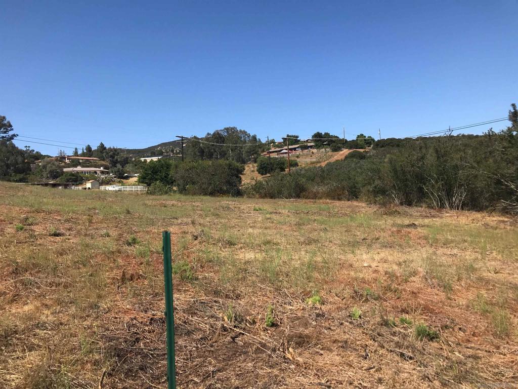 Two highly sought after lots are on the market, and being sold separately unless the buyer would like to purchase both. These lots are perfect for family or friends to buy two lots next to one another and build homes. These properties are large enough not only for custom homes, but for large garages for toys, barns, or additional structures such as an ADU. The original vision was a dual family compound. See the renderings of the custom home in the attachment for the buyers to see. The second lot is a little smaller but would be ideal for an ADU or building a second home. No building plans in place, but please view all attachments. With an added benefit the property has City water, it's both practical and a special place where future dreams can be built with comfort and ease. These lots are tucked away in the countryside of Jamul, yet close enough be go back and forth to the city in just a few minutes. The creek that winds through the property adds a sense of magic, a place where children can play while the adults watch from their porch. As the sun sets, the sky bursts into brilliant colors, turning every evening moment worth pausing for. Please, go take a look and feel free to walk around the property.