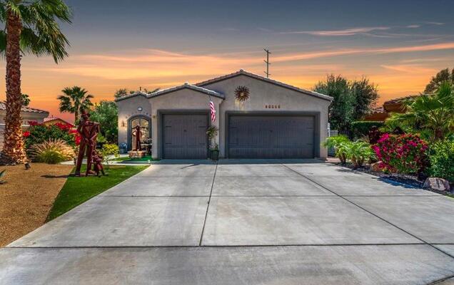 Resort style living in this exquisite Spanish style oasis, ideally situated on the most desirable lot at the end of the culdesac. As you step inside, the timeless elegance of Spanish tile flooring welcomes you, leading you through warm and inviting spaces. Entertain with ease at the wet bar, adorned with stunning granite countertops. The spacious kitchen, featuring a walk-in pantry and captivating views of the backyard, is perfect for culinary enthusiasts. Two bedrooms share a beautifully designed Jack and Jill bathroom, while the laundry room conveniently connects to the expansive threecar garage. The master suite serves as a private retreat, offering breathtaking views and a luxurious ensuite bathroom, complete with two walkin closets and upgraded amenities like a self flushing toilet and a bidet. A cozy fireplace enhances the living area's ambiance, and a versatile office/den space can easily transform into an additional bedroom. Step outside to your sprawling backyard, featuring a charming gazebo for family gatherings and a tranquil courtyard with a soothing water fountain. Dive into the generous pool or rinse off with the outdoor shower. With eight fruit trees including plum, fig, and grapefruit you can enjoy fresh produce year round. This property also includes a separate Casita, ideal for guests or rental opportunities. Centrally located near El Paseo's shopping, world class golf courses and entertainment options this home embodies luxury and convenience. PricedToSell