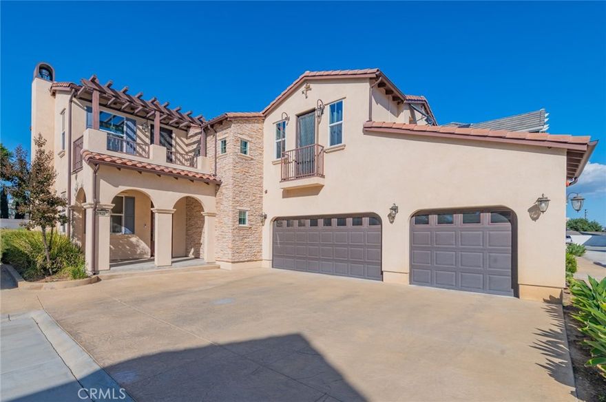 **Rarely available gated Luxury community in the region!!** Welcome to 10121 1/5 Washington Street. This beautifully luxurious single-family home combines modern elegance with energy efficiency in one of Bellflower’s most desirable gated communities: Arbor Village (HOA only $127/mo). Offering privacy, security, comfort and convenience, the home is just minutes from top-rated St. John Bosco School. Inside, you’ll find 4 bedrooms, 3 full bathrooms, and a versatile 5th room with a private balcony, perfect for an office, gym, or additional living space. 1 bedroom & 1 bath, and laundry room are conveniently located on first level. The spacious 3-car garage has custom cabinets and racks for extra storage, insulated doors, work bench, epoxy finished floor. Garage and extended driveway can accommodate parking for up to 6 vehicles. Every detail has been thoughtfully designed and tastefully upgraded. Highlights include: 9' high for each level, gorgeous LVP or porcelain flooring throughout, premium doors with hardware, upgraded windows and window treatments that maximize natural light, a fully remodeled kitchen with modern finishes and functionality, and an open-concept layout designed for effortless entertaining and everyday comfort. This superior condition home is further equipped with premium efficiency features, including: paid-off solar panels that generate enough energy for the entire home and a future pool, PEX plumbing, 200 amp electrical panel, a 220V EV charging station, whole-house water filtration system, and tankless water heater. For those dreaming of a backyard oasis, HOA-approved pool plans are transferable (ready for submission to City). Located near major freeways, commuting is a breeze. Paired with one of the area’s best schools, this property offers an unmatched combination of luxury, sustainability, and convenience. Schedule your private showing today and experience everything this flawless home has to offer! "List of Special Features" is available upon request. 3D virtual tour is available at: https://my.matterport.com/show/?m=ihsdQzLB9Mw&brand=0