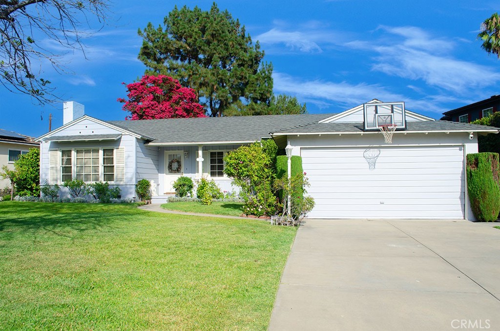 Take advantage of this wonderful house in a quiet corner of Arcadia. A single level house with 3beds, 2bathroom in approximately 1,392SF of living space. A patio in back overlooking the expansive lawn for outdoor play and living. Roomy kitchen with nook for meals or homework. Formal dining room with pocket door. Fireplace in living room. Wood floors. Many built-ins, shelving, and storage. Large shaded back yard with mature trees. 2-car garage with extra parking in the driveway. Arcadia schools. Near race track, freeway access, shopping and restaurants. The house is light and bright and the bedrooms are large. Come to make it your new home.