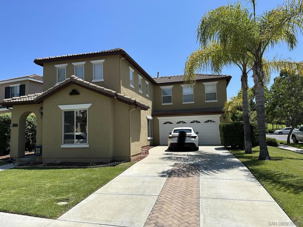 Beautiful corner lot 3 bedroom/3 bath home in Otay Ranch. One bedroom and full bath downstairs! Just a short walk to park and amenities! . This home boasts newer cabinets and appliances in the kitchen, wood flooring in the living and office room, and bathrooms with new fixtures. Newer AC and rain gutters. Short distance to Otay ranch Mall and schools. Long driveway to accommodate several cars. 1 year lease.