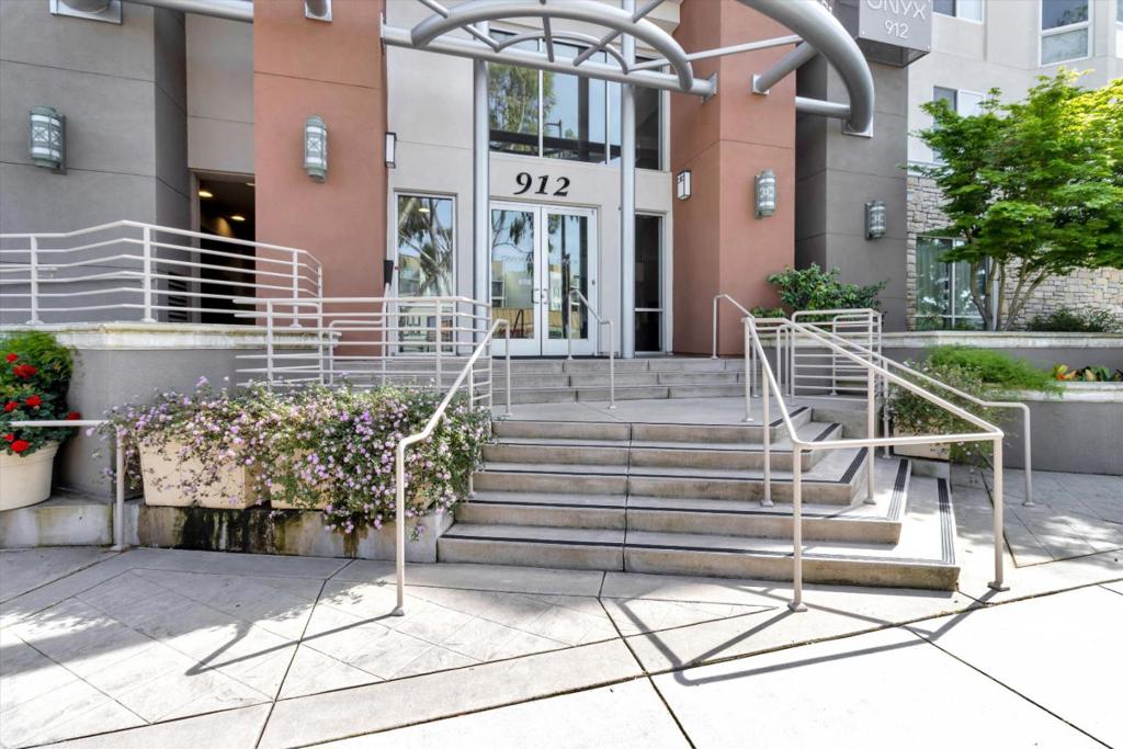 Welcome to this charming 2-bedroom, 2-bathroom home located in the vibrant city of Campbell. This residence offers a thoughtfully designed kitchen equipped with modern appliances including a dishwasher, microwave, garbage disposal, built-in oven range with gas, and refrigerator, making culinary endeavors a delight. The home boasts laminate flooring throughout, providing a clean and contemporary feel. Relax in the cozy living room, which features a fireplace perfect for evening ambiance. With high ceilings and a spacious walk-in closet, this home ensures comfort and ample storage. Central AC and forced air heating maintain the ideal climate year-round. Practical amenities include a washer and dryer for convenient laundry care and an electric vehicle hookup (Level 2, 240 volts) in the secured garage. This property is situated within the Campbell Union Elementary School District, providing educational options for young families. Don't miss the opportunity to make this delightful Campbell home yours.
