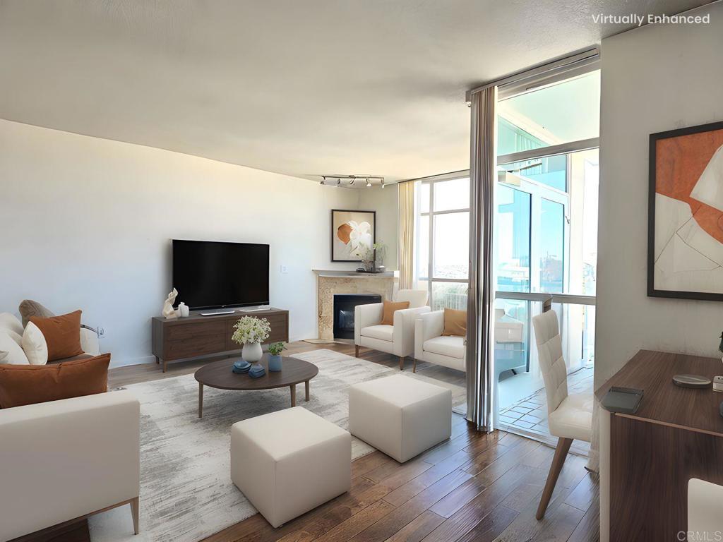 Luxury Living at the Discovery Building – Cortez Hill Experience upscale city living in this stunning 14th-floor condo at the prestigious Discovery Building. Enjoy sweeping city views from your private balcony, a cozy living room with fireplace, sleek granite countertops, stainless steel appliances, wine cooler, and a new in-unit washer/dryer. The spacious layout features two bedrooms, including a primary suite with walk-in closet and a newly renovated en-suite bath. Includes 2 underground parking spaces, common bike storage and extra storage inside garage. Resort-Style Amenities Residents enjoy 24/7 concierge, a fitness center, sauna, steam room, business center, EV charging, rooftop pool/spa with panoramic views, BBQs, fire pits, and a chic lounge. Prime Location Located in vibrant Cortez Hill, you’re a short walk to the Gaslamp Quarter, Little Italy, Balboa Park, Petco Park, and trolley station. Close to top dining, entertainment, and culture, while still enjoying the tranquility of a quiet neighborhood, Ideal for relaxed living in the heart of the city. Lease Details: 12-month lease, No smoking, Strong credit, stable income, and positive rental/mortgage history required. Tenants pay gas, electricity, internet, and must carry renter’s insurance. Owner covers HOA fees, water, and trash.
