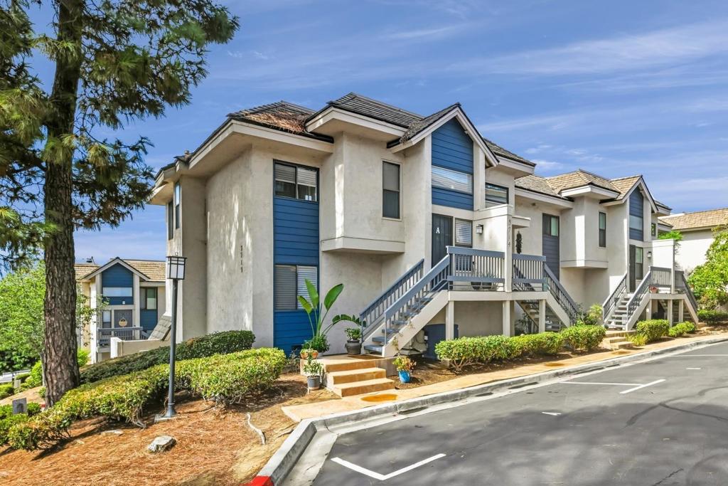Welcome to this beautifully designed end-unit townhome offering a perfect blend of comfort, functionality, and coastal charm. Parking is plentiful with a total of three spaces — two in the garage and one dedicated outdoor space labeled "A" located directly in front of the unit. Upon entry, you'll have the option to head upstairs to the main living area, where you'll find a spacious living room, dining area, and a modern kitchen equipped with appliances, most are about a year old. A convenient half bath and a west-facing balcony complete this level, offering peaceful ocean views — ideal for enjoying sunsets and fresh coastal breezes. From the entry level, you can also head downstairs to the private sleeping quarters, featuring two generously sized en-suite bedrooms - one with a balcony, perfect for comfort and privacy. Below the bedroom level, you'll find direct access to the attached two-car garage, which includes laundry hookups. A community, pool, spa, racquetball courts are an added bonus. This home combines thoughtful layout, modern convenience, and water views — don’t miss this fantastic opportunity!